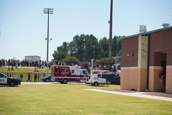 WINDER, GEORGIA - SEPTEMBER 4: Students wait to be picked up by their parents after a shooting at Apalachee High School on September 4, 2024 in Winder, Georgia. Multiple fatalities and injuries have been reported and a suspect is in custody according to authorities. (Photo by Megan Varner/Getty Images)