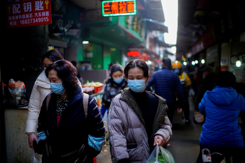 The virus has returned to Wuhan, the city brought to its knees at the start of the pandemic. Source: Reuters