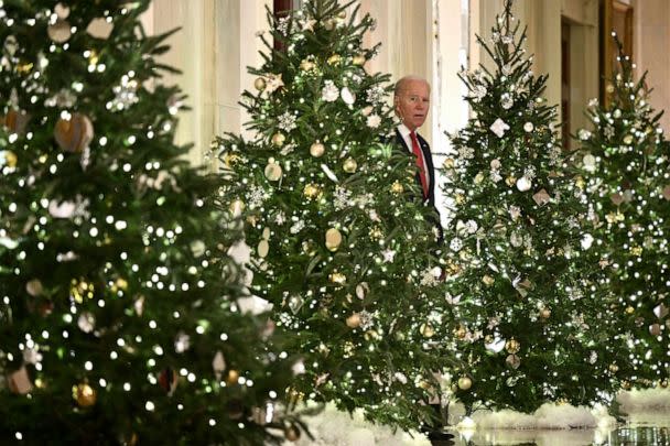 PHOTO: President Joe Biden arrives to deliver a Christmas address from the Cross Hall of the White House in Washington, DC, Dec. 22, 2022. (Brendan Smialowski/AFP via Getty Images)