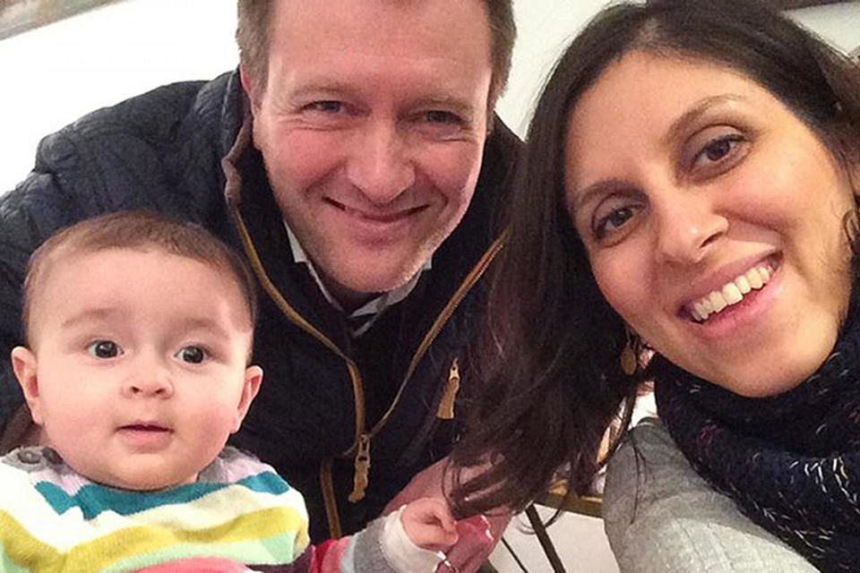 Nazanin with her husband and daughter Gabriella: PA