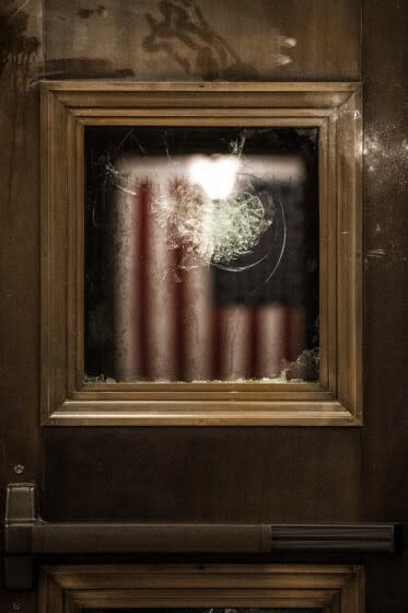 Glass smashed by protesters inside the U.S. Capitol Building.