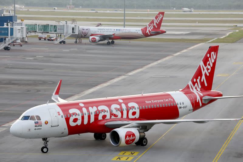 AirAsia planes are seen on the tarmac of Kuala Lumpur International Airport 2 (KLIA2) in Sepang