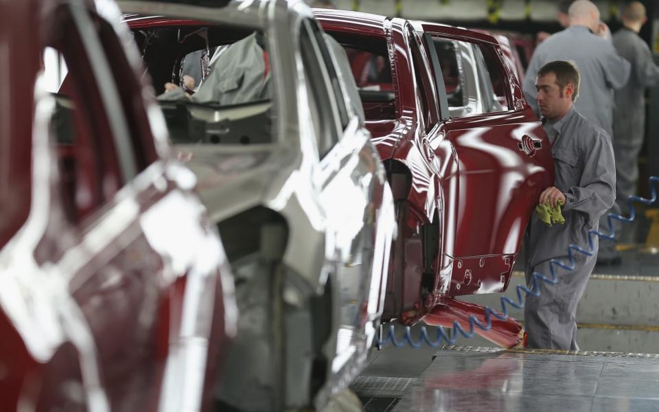 A worker on Nissan's production line at the company's giant Sunderland plant - Getty Images Europe