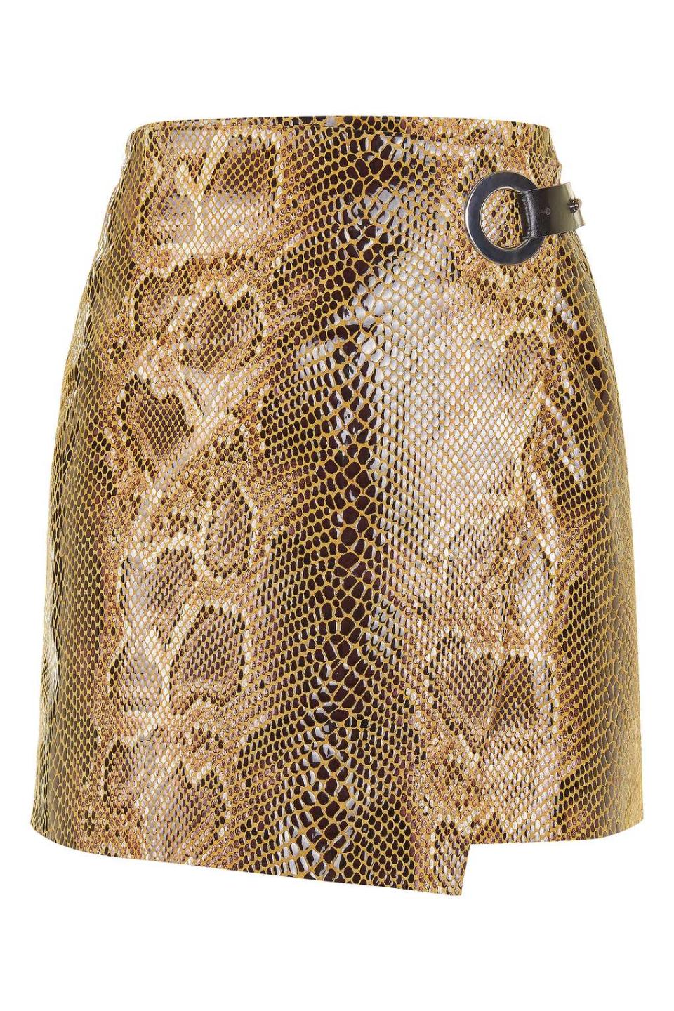 <p><a rel="nofollow noopener" href="http://www.topshop.com/en/tsuk/product/sale-offers-4181277/sale-3267090/snake-eyelet-leather-skirt-6119956?bi=320&ps=20" target="_blank" data-ylk="slk:Topshop, £40;elm:context_link;itc:0;sec:content-canvas" class="link "><i>Topshop, £40</i></a> </p>