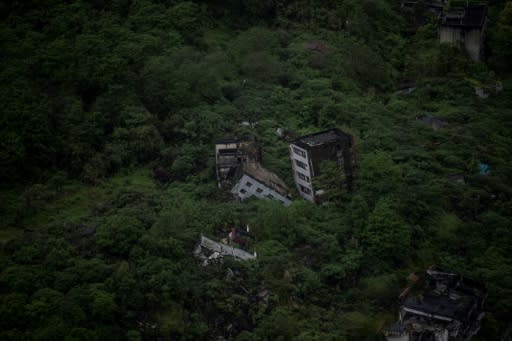 Nature is gradually reclaiming the homes that were destroyed by the 2008 quake, despite efforts to preserve Beichuan as a living monument to those who were killed