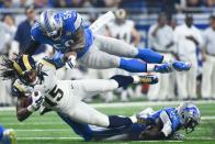 <p>Detroit Lions middle linebacker Tahir Whitehead (59) tackles Los Angeles Rams wide receiver Bradley Marquez (15) during the second quarter at Ford Field. Mandatory Credit: Tim Fuller-USA TODAY Sports </p>