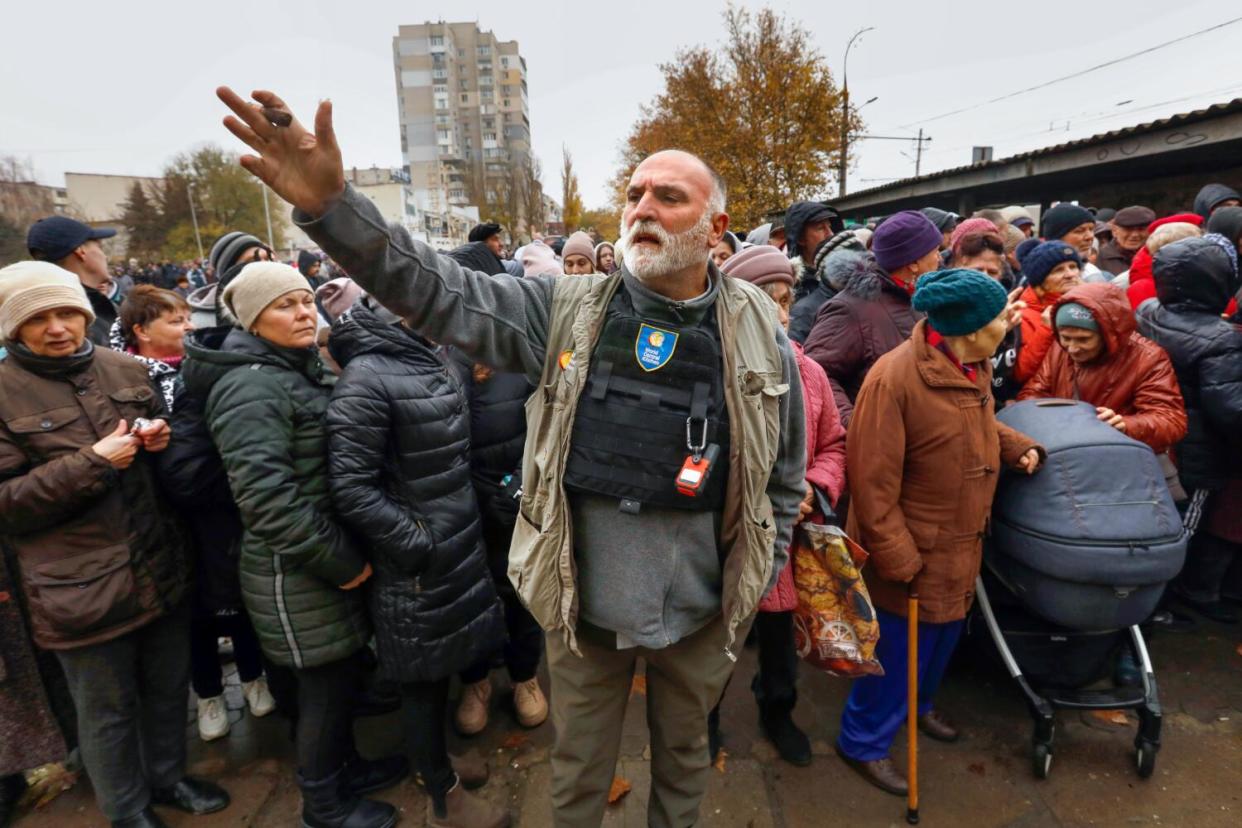 José Andrés standing in the middle of a crowd in Ukraine.