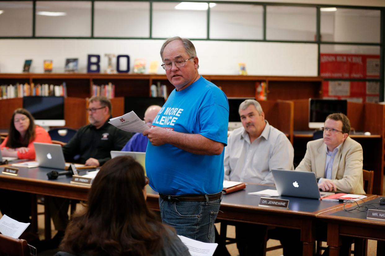 Billy Ison makes a statement against arming teachers during a meeting of the school board at Madison Jr./Sr. High School in Madison Twp., Ohio, on Tuesday, April 24, 2018. The school board voted unanimously to approve arming educators inside of schools.