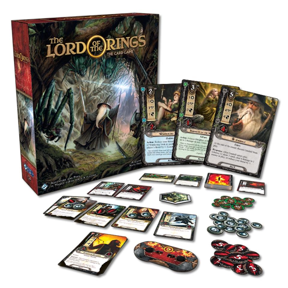 The box and game set up for Fantasy Flight Games's The Lord of the Rings: The Card Game Revised Core Set