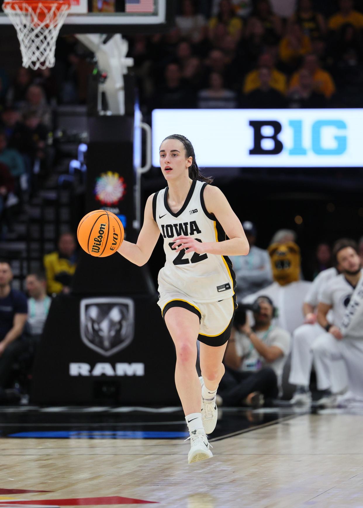 MINNEAPOLIS, MINNESOTA - MARCH 08: Caitlin Clark #22 of the Iowa Hawkeyes brings the ball up court against the Penn State Nittany Lions in the Quarterfinal Round of the Big Ten Tournament at Target Center on March 08, 2024 in Minneapolis, Minnesota.(Photo by Adam Bettcher/Getty Images)