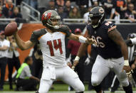 Tampa Bay Buccaneers quarterback Ryan Fitzpatrick (14) throws as Chicago Bears defensive end Akiem Hicks (96) pressures him during the first half of an NFL football game Sunday, Sept. 30, 2018, in Chicago. (AP Photo/David Banks)