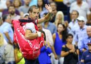 Sep 9, 2015; New York, NY, USA; Richard Gasquet of France waves to the crowd as he leaves the court after his match against Roger Federer of Switzerland on day ten of the 2015 U.S. Open tennis tournament at USTA Billie Jean King National Tennis Center. Mandatory Credit: Jerry Lai-USA TODAY Sports
