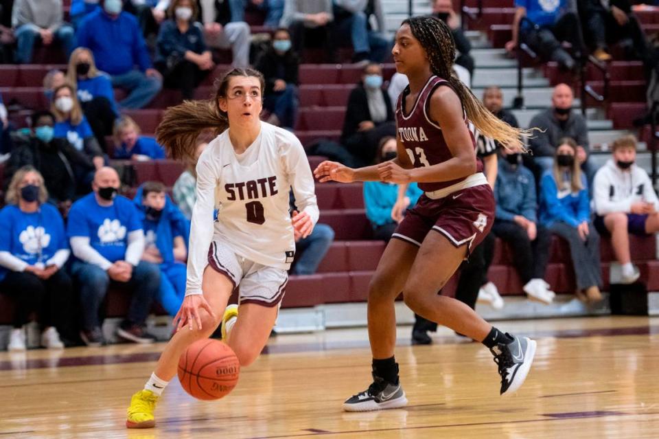 State College’s Diana Tsarnakova dribbles the ball during a high school girls basketball game featuring State High and Altoona on Tuesday, Jan. 25, 2022 in State College, Pa.