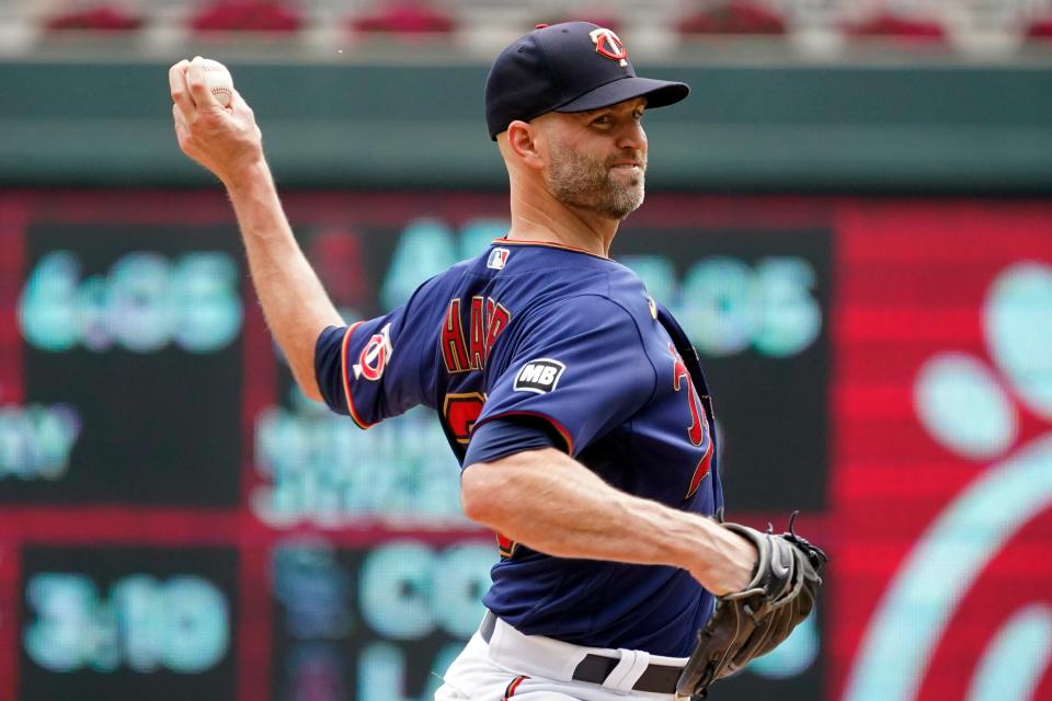 Minnesota Twins' pitcher J.A. Happ throws against the Detroit Tigers in the first inning of a baseball game, Wednesday, July 28, 2021, in Minneapolis.