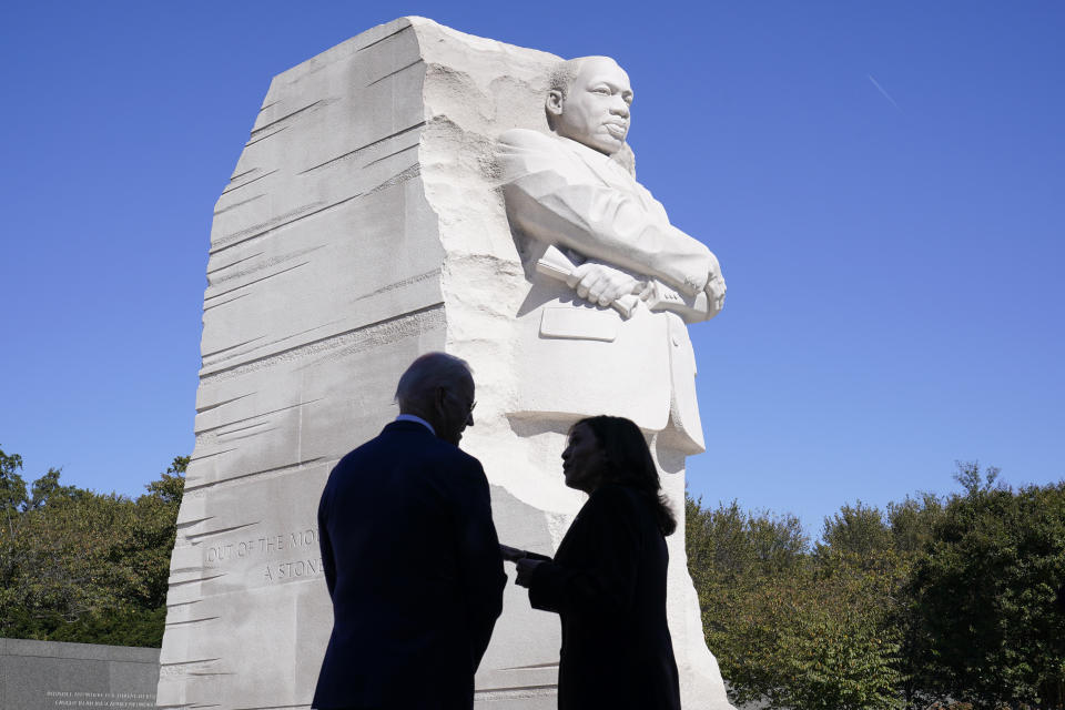 President Joe Biden and Vice President Kamala Harris stand together at the Martin Luther King, Jr. Memorial as they arrive to attend an event marking the 10th anniversary of the dedication of memorial in Washington, Thursday, Oct. 21, 2021. (AP Photo/Susan Walsh)