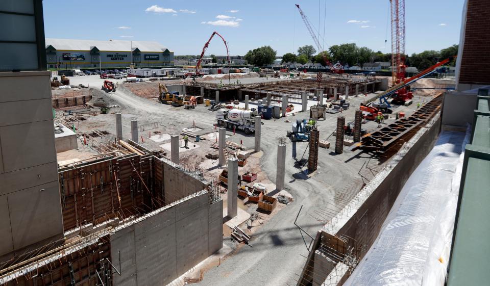 Construction crews work to build underground parking and expanded practice facilities at Lambeau Field on June 17, 2022, in Green Bay, Wis. The project is scheduled for completion in 2023.