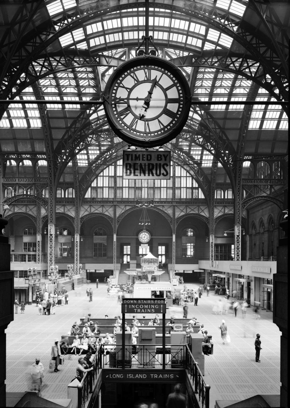FILE - This April 24, 1962 file photo provided by theLibrary of Congress shows the main concourse of the original Pennsylvania Station in New York, photographed as part of the federal Historic American Buildings Survey. The original station, built a century ago as a Beaux Arts masterpiece of soaring beauty, classical columns and natural light, was modeled after the monuments of ancient Rome. It was torn down in 1963 and replaced with the current, smaller Penn Station, notable for its blandness - topped with the familiar circular Madison Square Garden, which was among the first buildings of its kind to be built above the platforms of an active railroad station. (AP Photo/Cervin Robinson, Library of Congress, File)