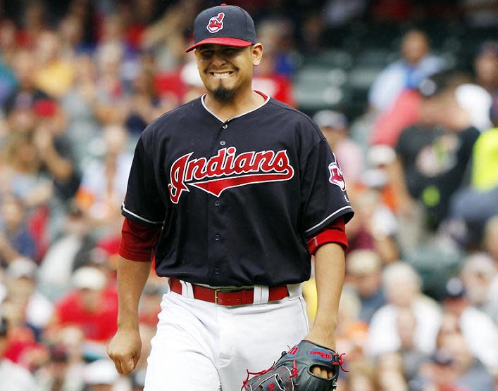 Indians right-hander Carlos Carrasco leaves Saturday's game after suffering a non-displaced fracture of the fifth metacarpal in his pitching hand. (Getty)