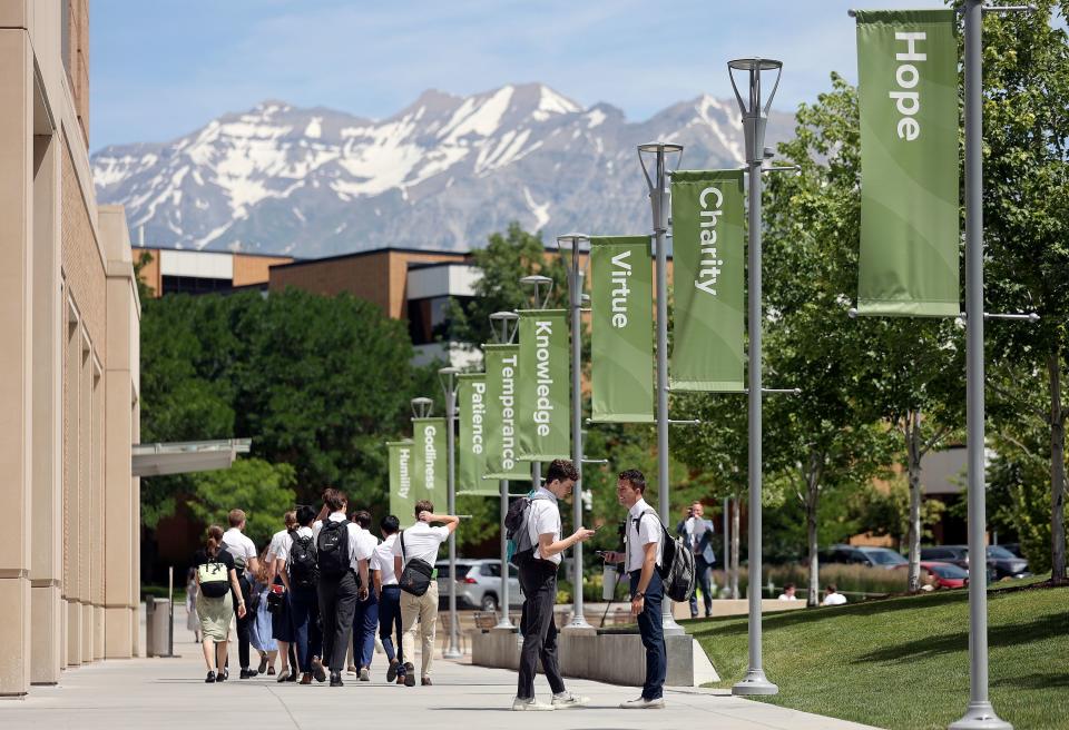 Missionaries walk through campus at the Missionary Training Center in Provo on Thursday, June 22, 2023. | Kristin Murphy, Deseret News