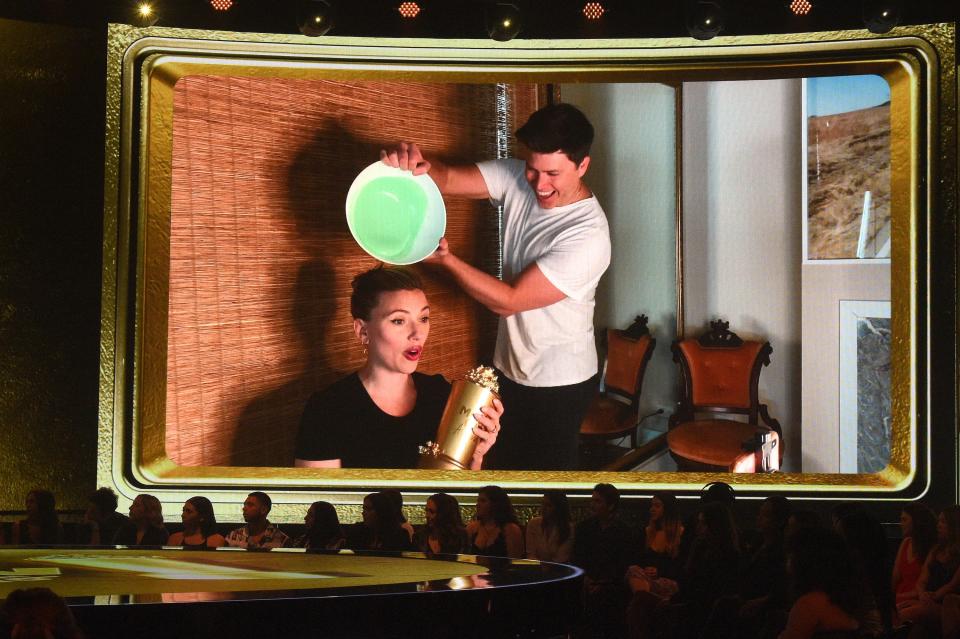 "What the (expletive)," Johansson exclaimed after getting slimed by husband Jost.