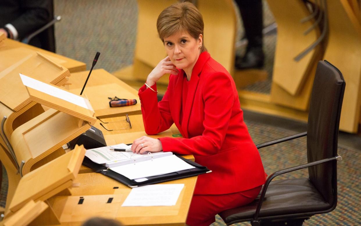 Nicola Sturgeon during FMQ's at the Scottish Parliament on Thursday - Robert Perry/Getty Images