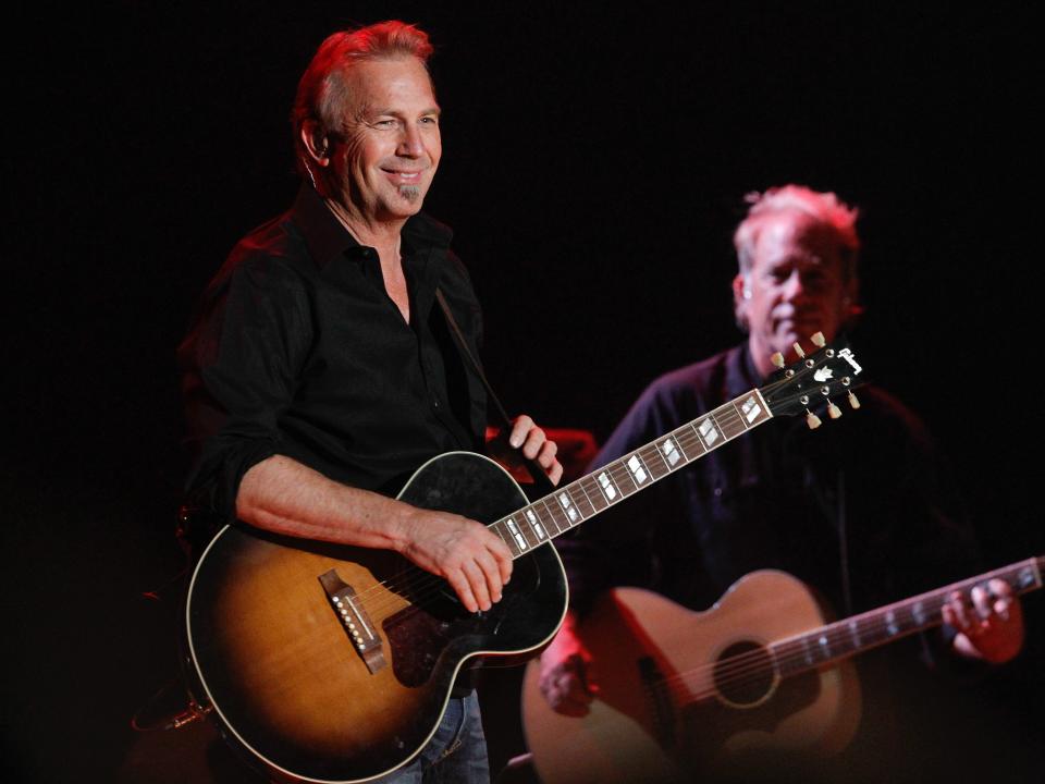 Kevin Costner performing with his band the Modern West in 2014 in Nashville, Tennessee.