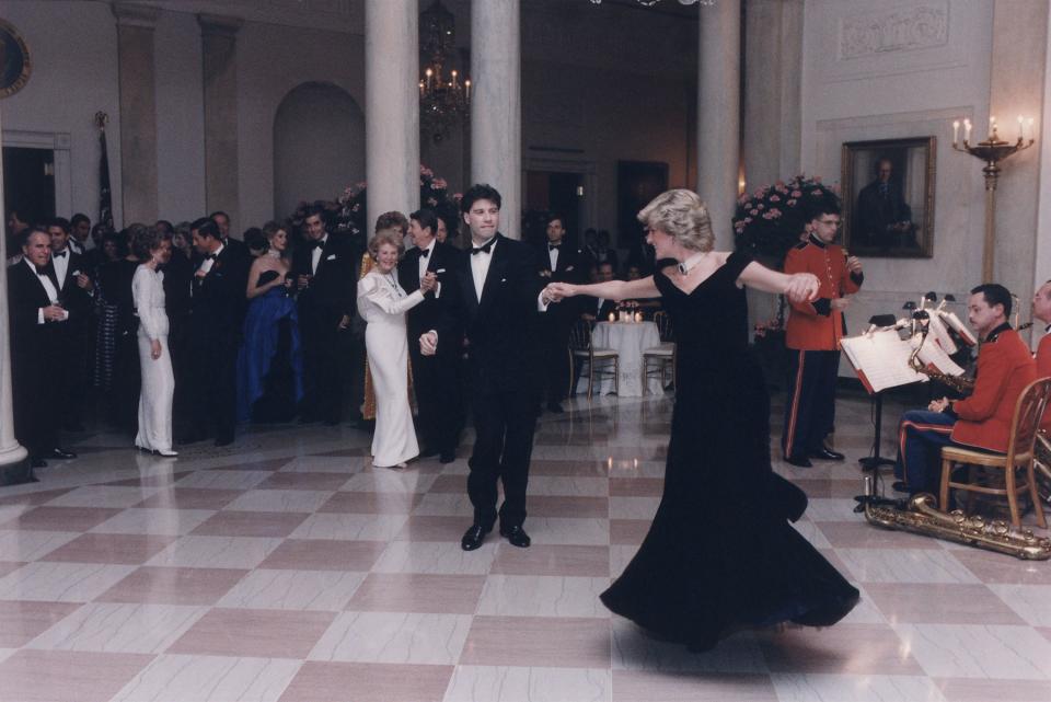 <span><span>Princess Diana dancing with John Travolta after a White House dinner for the Prince and Princess of Wales. </span><span>Everett/Shutterstock</span></span>
