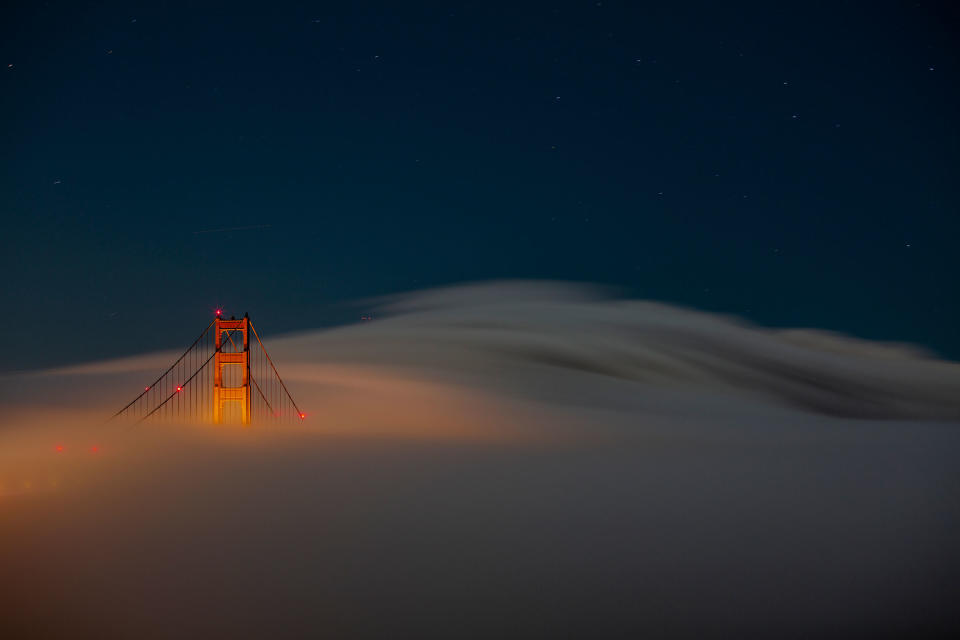 Fog rolls through the Marin Headlands and Golden Gate Bridge in Sausalito, Calif., on June 11.<span class="copyright">Nina Riggio—The New York Times/Redux</span>