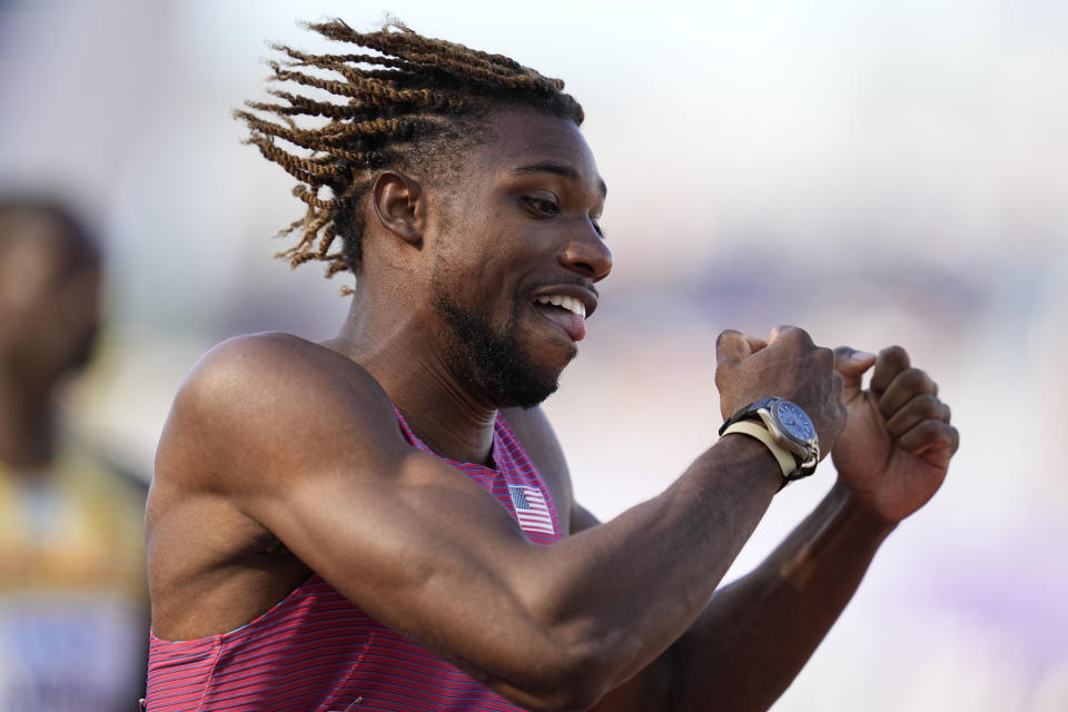 Noah Lyles, of the United States, wins a heat in the men's 200-meter run at the World Athletics Championships on Monday, July 18, 2022, in Eugene, Ore. (AP Photo/Ashley Landis)