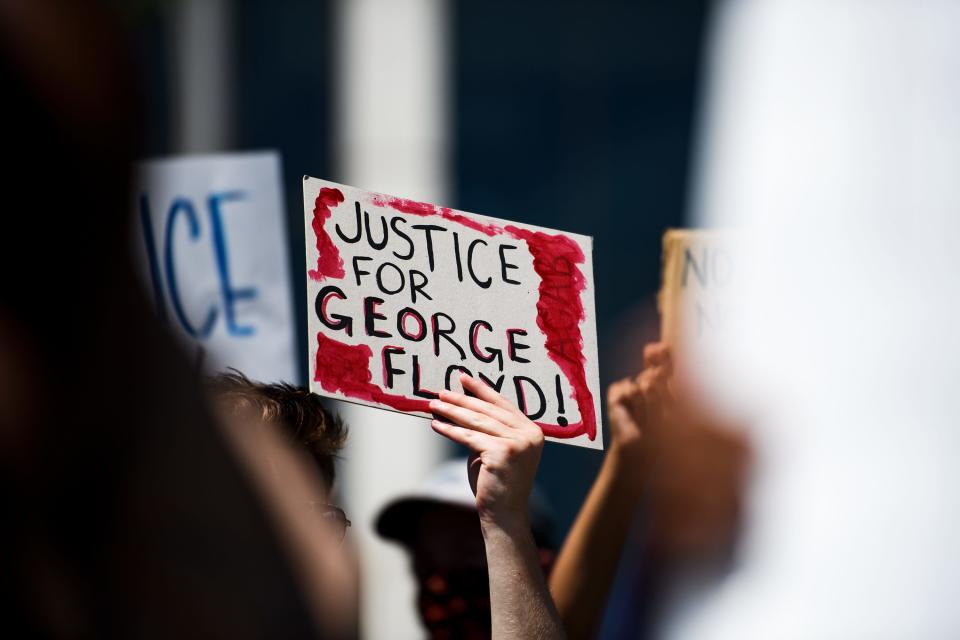 Protestors gather outside of the Peace Center to participate in a demonstration against police brutality in the wake of the death of George Floyd Saturday, May 30, 2020.