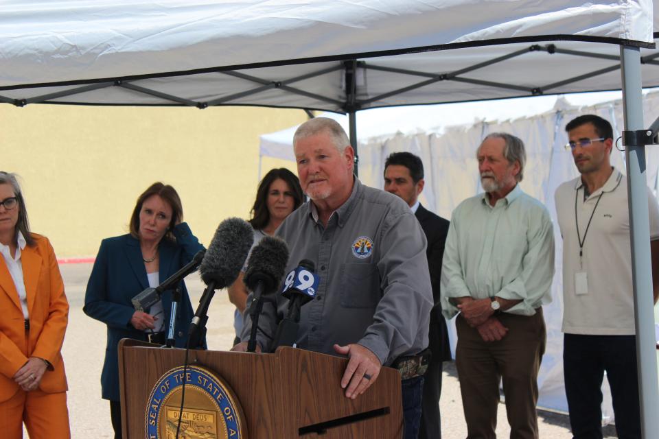 Allen Clark, director of the Arizona Division of Emergency Management, speaks at a news conference outside of the Casa Alitas Drexel Center in Tucson on Tuesday, May 9, 2023.