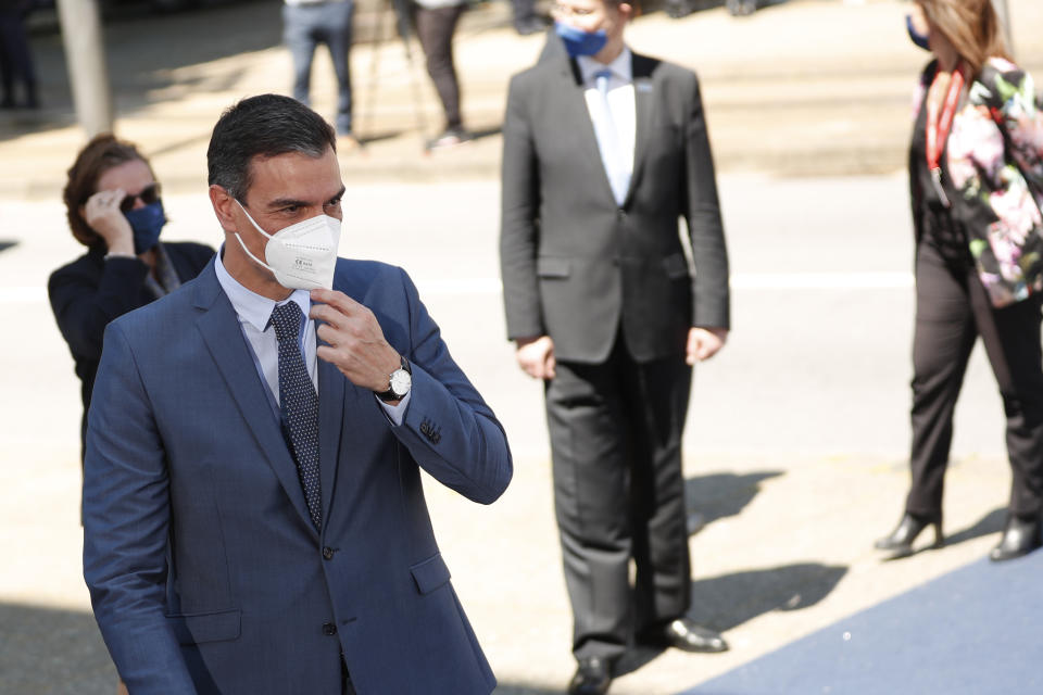 Spain's Prime Minister Pedro Sanchez arrives for an EU summit at the Alfandega do Porto Congress Center in Porto, Portugal, Friday, May 7, 2021. European Union leaders are meeting for a summit in Portugal on Friday, sending a signal they see the threat from COVID-19 on their continent as waning amid a quickening vaccine rollout. Their talks hope to repair some of the damage the coronavirus has caused in the bloc, in such areas as welfare and employment. (AP Photo/Francisco Seco, Pool)