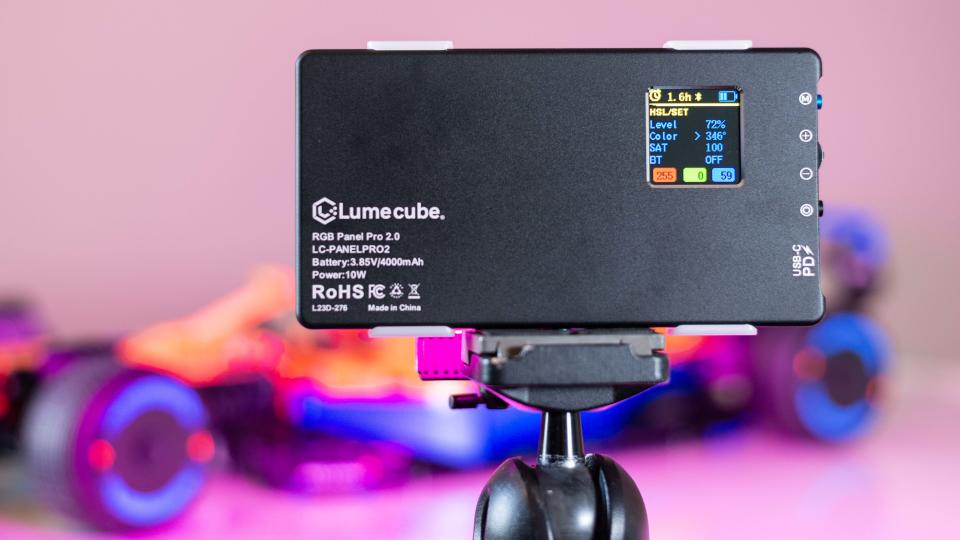 The Lume Cube RGB Panel Pro 2.0 emitting a purple light.