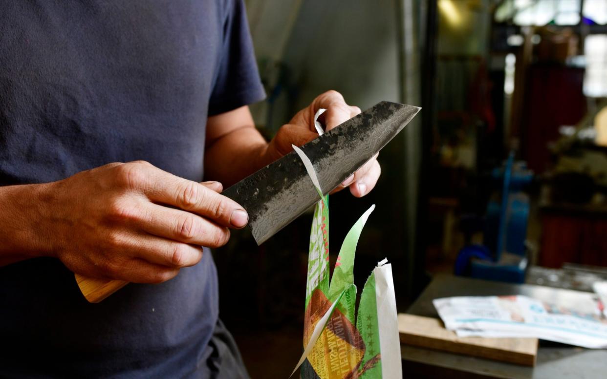 Knife sharpening, cutting the paper