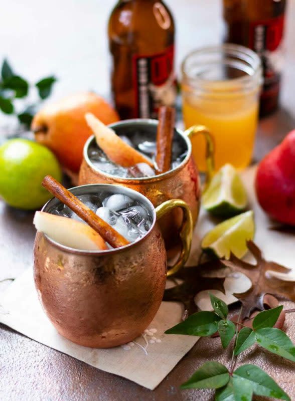 <p>A Southern Soul</p><p>Usher in Autumn with a Spiced Pear Moscow Mule! This seasonal twist to the classic cocktail is refreshing and easy to make with pear infused simple syrup, vodka, ginger beer, and a squeeze of fresh lime. It’s the perfect drink to sip on this fall.</p><p><strong>Get the recipe: <a href="https://www.asouthernsoul.com/spiced-pear-moscow-mule/" rel="nofollow noopener" target="_blank" data-ylk="slk:Spiced Pear Moscow Mule;elm:context_link;itc:0;sec:content-canvas" class="link ">Spiced Pear Moscow Mule</a></strong></p>