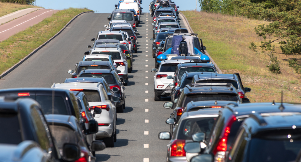 Cars on a highway as NSW introduces new law changes for overseas and interstate travellers. 