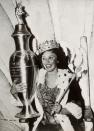 <p>Henrietta Leaver from Pittsburgh placed the ceremonial robe and crown over her gold lamé evening gown when she was crowned Miss America in 1935. </p>