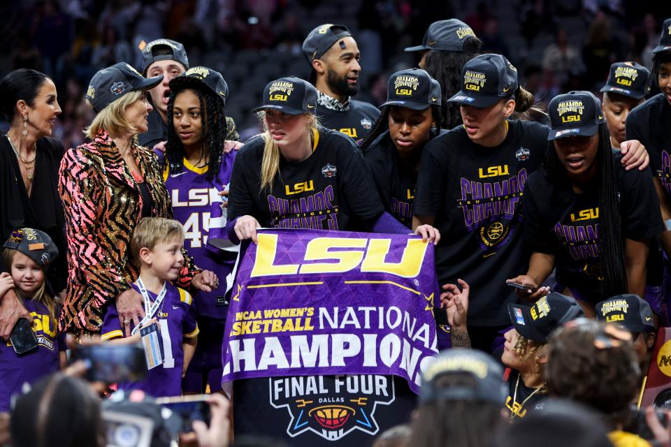 Apr 2, 2023; Dallas, TX, USA; The LSU Lady Tigers celebrate after defeating the Iowa Hawkeyes during the final round of the Women's Final Four NCAA tournament at the American Airlines Center. Mandatory Credit: Kevin Jairaj-USA TODAY Sports