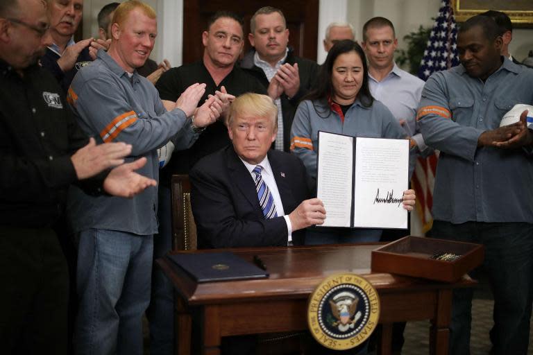 Donald Trump signs order imposing tariffs on steel and aluminium - but promises exemptions for 'real friends'