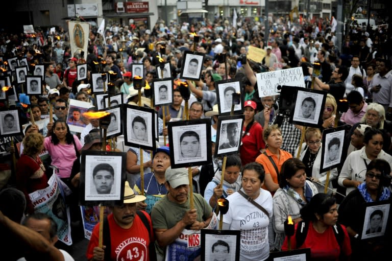 Less than two years ago the parents of 43 missing students would have been surrounded by thousands of people when they marched, but only a few hundred turned out this time in Mexico City