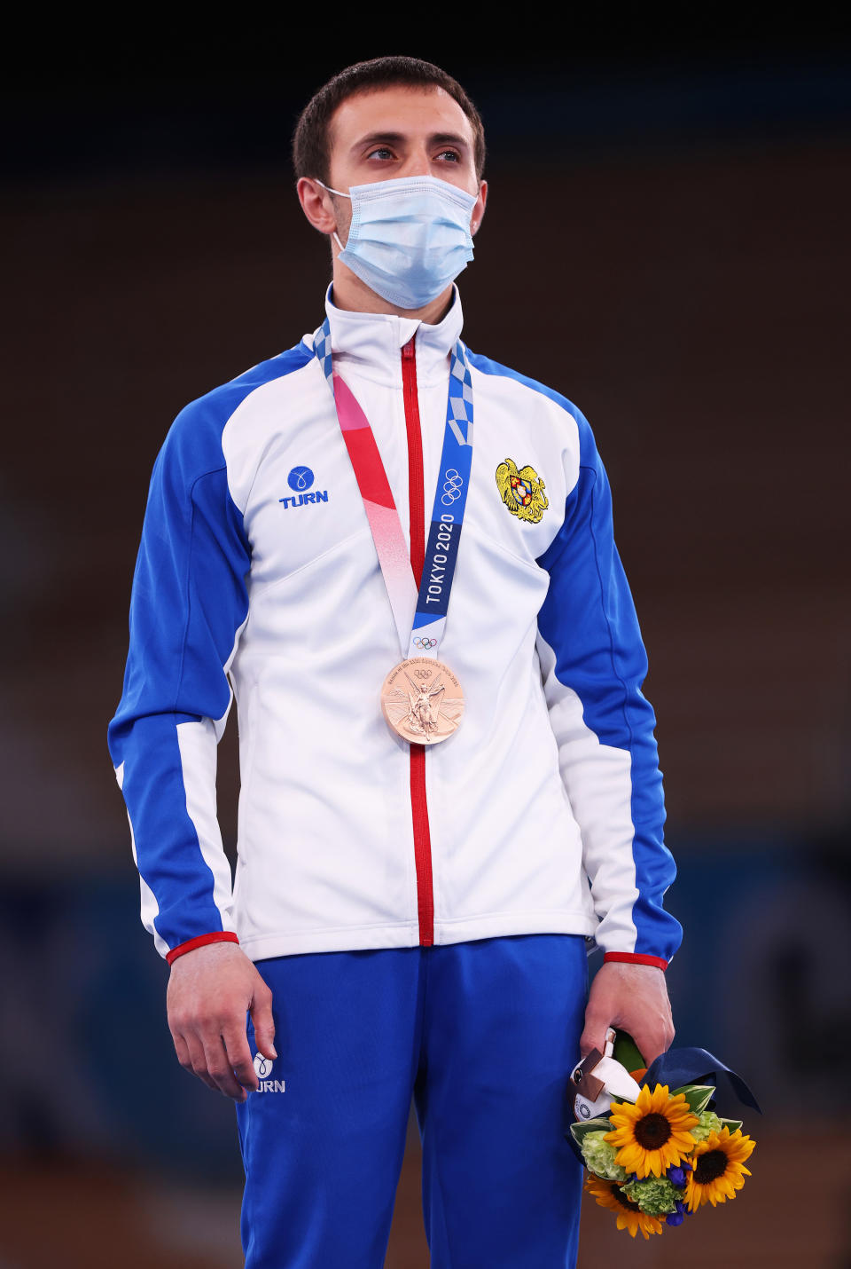 Artur Davtyan of Team Armenia stands with his bronze medal