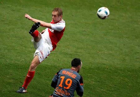 Football Soccer - Monaco v Lorient - French Ligue 1 - Louis II stadium, Monaco 22/1/17. Monaco's Kamil Glik (L) challenges Lorient's Romain Philippoteaux . REUTERS/Eric Gaillard