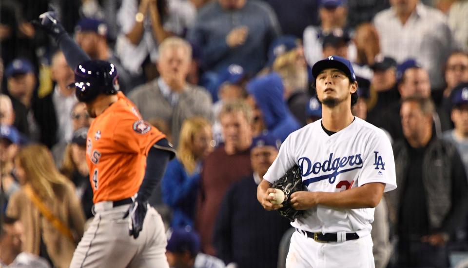 Yu Darvish reacts after giving up a home run in Game 7 of the 2017 World Series vs. Houston.