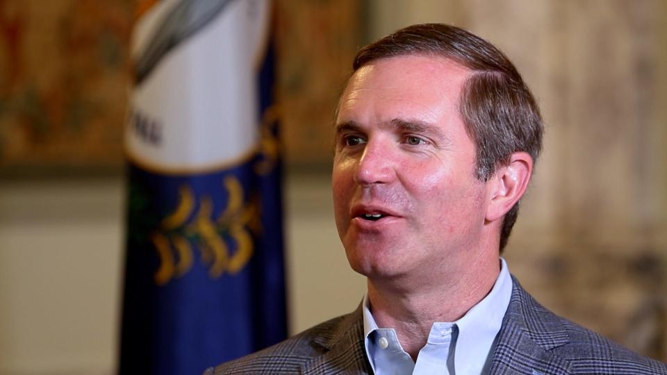 STILL FROM VIDEO: Kentucky Governor Andy Beshear talks to Courier Journal reporters Olivia Evans and Connor Giffin about the investments Kentucky has seen in the area of electric vehicles.