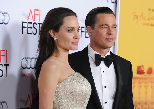 HOLLYWOOD, CA - NOVEMBER 05:  Angelina Jolie and Brad Pitt attend the premiere of 