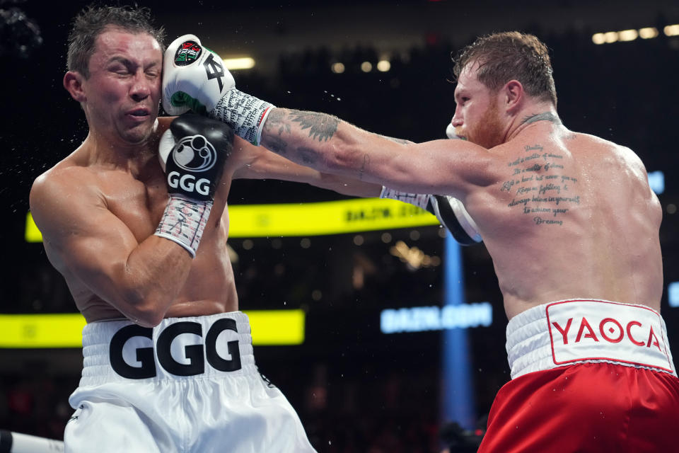 Canelo Alvarez (red trunks) and Gennadiy Golovkin (white trunks) box during a super middleweight championship bout at T-Mobile Arena. (Joe Camporeale, USA TODAY Sports)