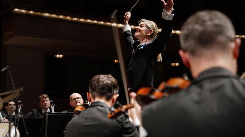 Conductor Keri-Lynn Wilson and the Ukrainian Freedom Orchestra appear at Teatr Wiekli, Warsaw. They are among the subjects in Larry Weinstein's sweeping documentary Beethoven's Nine.  