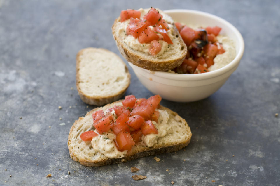 This Sept. 30, 2013 photo shows Italian-style hummus with diced tomatoes in Concord, N.H. (AP Photo/Matthew Mead)