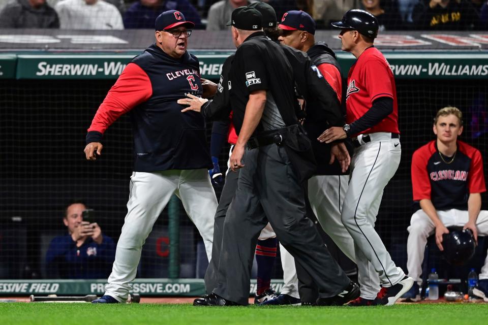 Cleveland Guardians manager Terry Francona, left, is restrained while arguing with home plate umpire Ron Kulpa after being ejected during a game against the Los Angeles Angels on Sept. 12, 2022, in Cleveland.