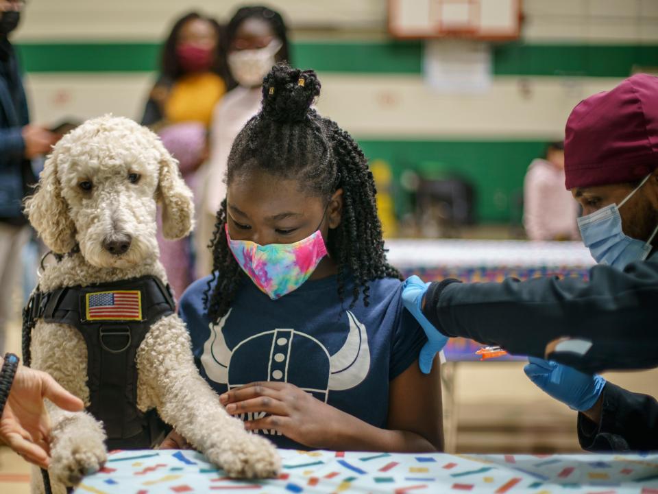 child getting vaccine shot